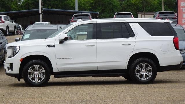 2022 GMC Yukon SLE in Summit White — front three-quarter view