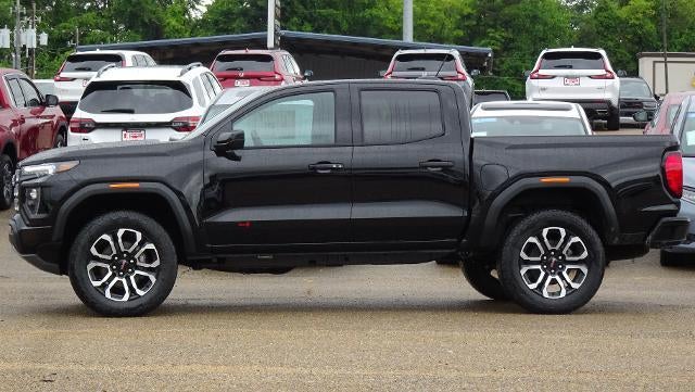 2026 GMC Canyon AT4 in Onyx Black — front three-quarter view