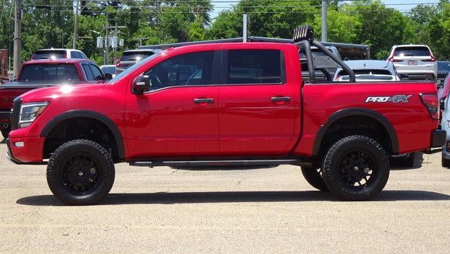 2021 Nissan Titan PRO-4X in Red — front three-quarter view