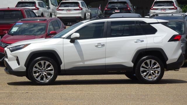 2023 Toyota RAV4 Limited in White — front three-quarter view