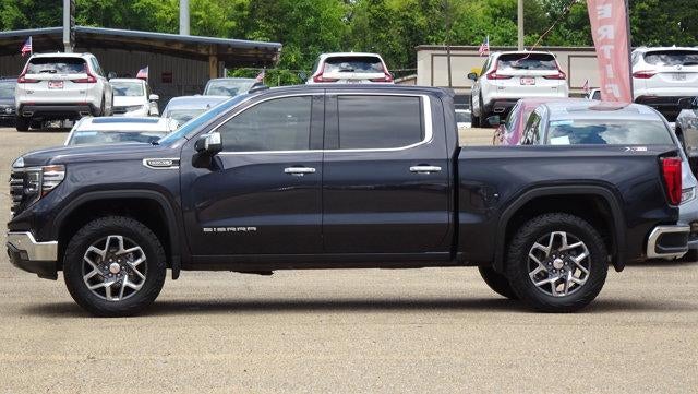 2022 GMC Sierra 1500 SLT in Titanium Rush Metallic — front three-quarter view