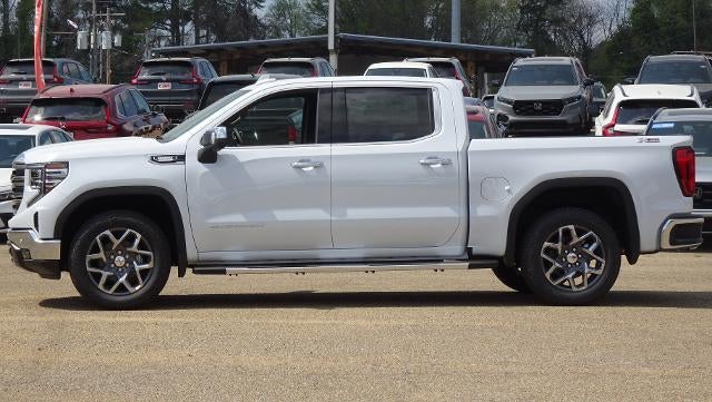 2026 GMC Sierra 1500 SLT in Glacier White Tricoat — front three-quarter view