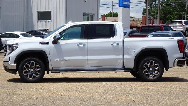 2026 GMC Sierra 1500 SLT in Glacier White Tricoat — front three-quarter view