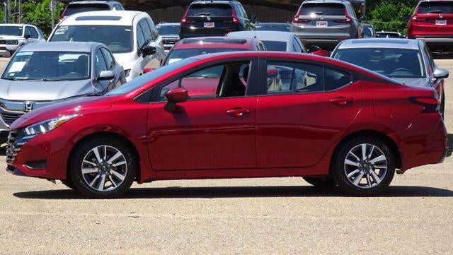 2023 Nissan Versa SV in Red — front three-quarter view